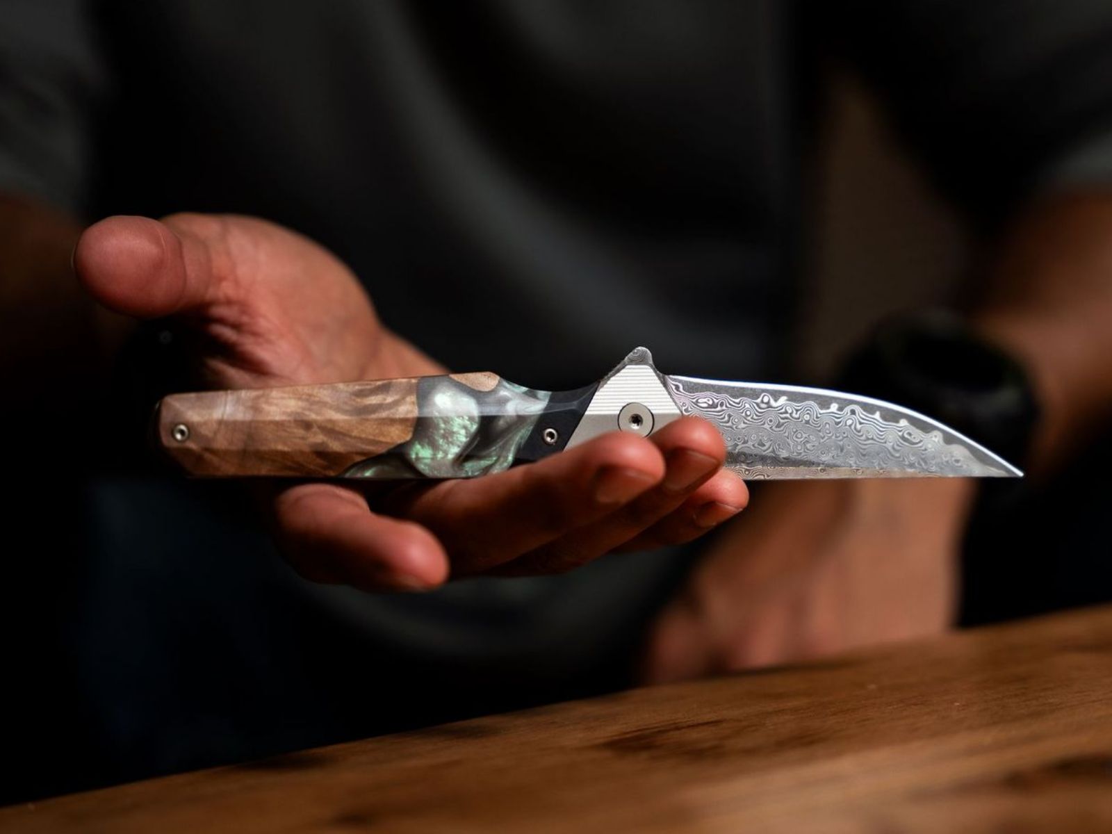 Carved Live Edge Knife in persons hand