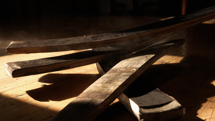 Whiskey barrel wood production pieces being prepared for handcrafted knife handles.